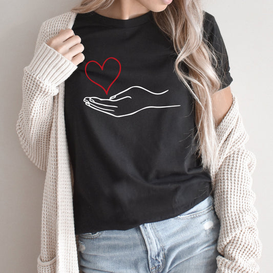 Hand Holding Heart Graphic Tee | Scatter Kindness | Be Positive | Kindness | Be Kind